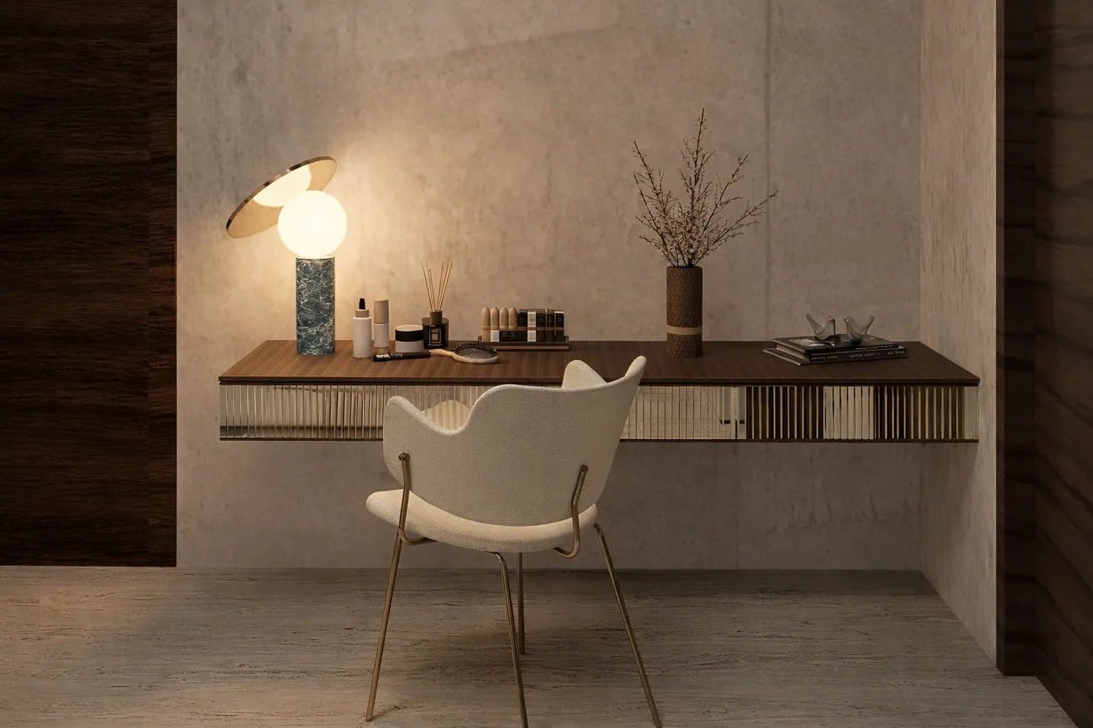 Estudio con escritorio flotante, silla neutra y lámpara escultórica